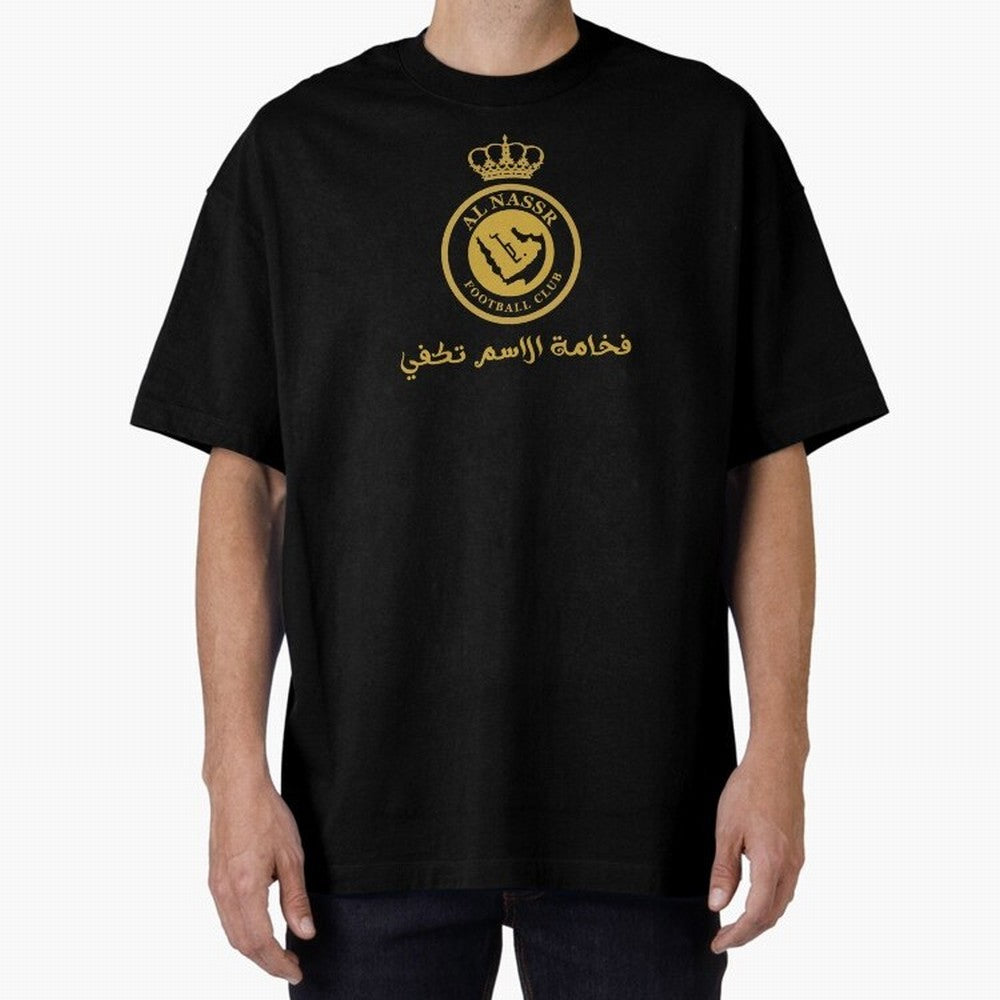 Al-Nassr Football Club - Oversized T-Shirt Capture Stadium Memories from Match Day Hype around FIFA World Cup 2026 Group Stage, Messi, CR7 and Mbappe, Germany, Global Supporter Spirit, Legendary Goals, National Colors and Tournament Celebration;
