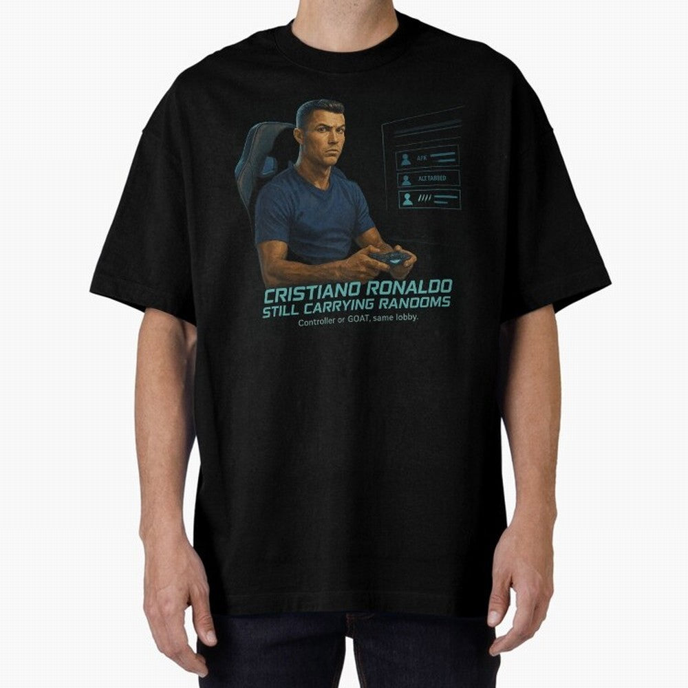 Cristiano Gamer Mode ¡ª Still Carrying Randoms Oversized T-Shirt Back the Journey through Global Football Passion for FIFA World Cup 2026 Group Stage, Centered on CR7, Argentina, France and Brazil, Goal Celebration Energy, Supporter Heritage,