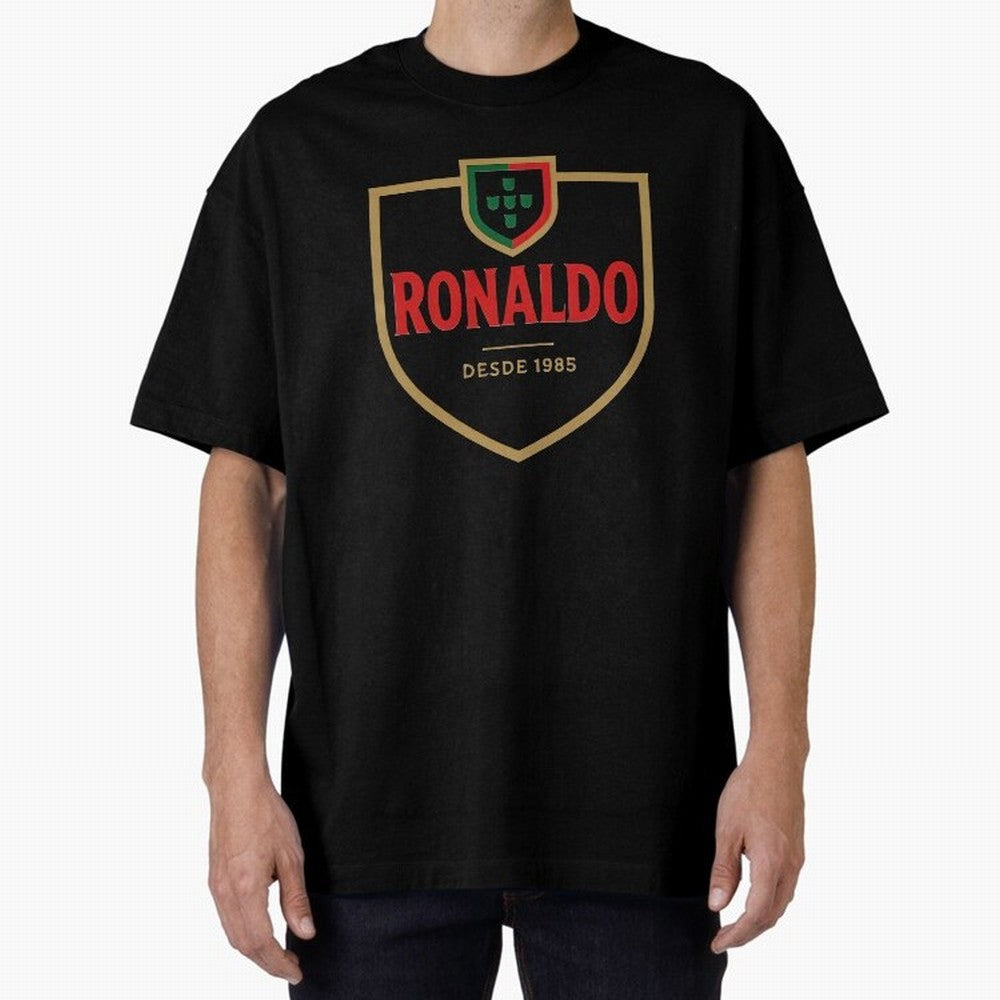 Ronaldo Emblem Sticker ¨C Gold Crest Parody Design Oversized T-Shirt Step into FIFA World Cup 2026 for Fans of Cristiano Ronaldo and France and Portugal, Bringing Retro Football Energy, Iconic Rivalries, Trophy Chase Drama and Stadium Atmosphere;