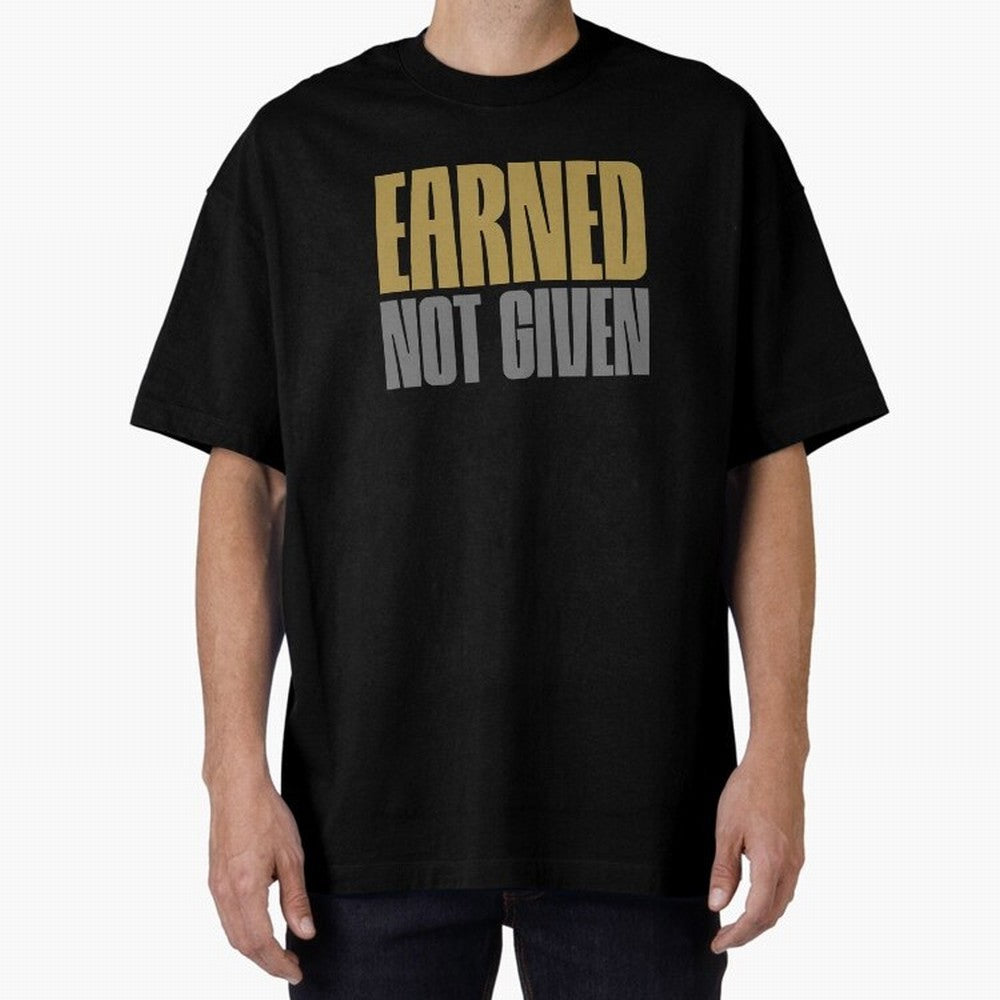 Earned not given Oversized T-Shirt Treasure the FIFA World Cup 2026 USA Canada Mexico Journey through CR7 and Messi Highlights, Brazil Pride, Soccer Culture, Superstar Moments, National Team Dreams and Competitive Fire; Ideal for Fans Who Follow